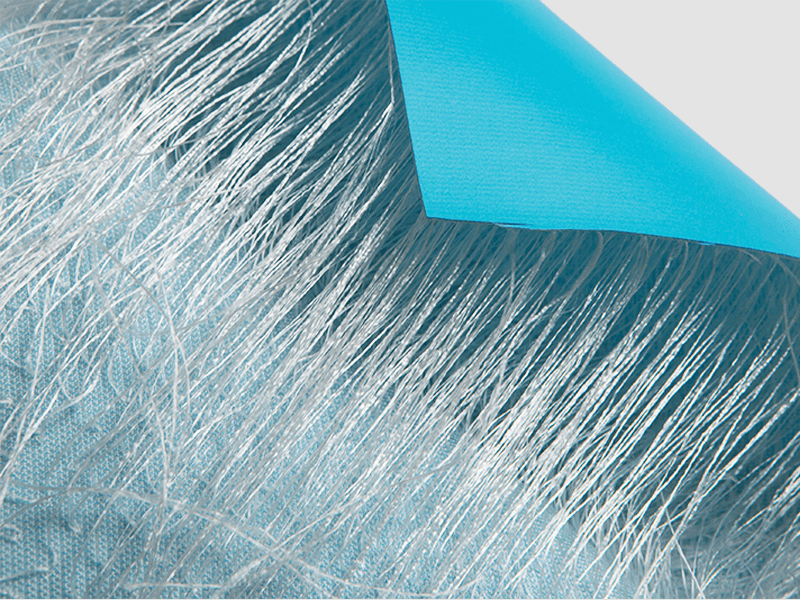 Quel est le revêtement protecteur appliqué sur le tissu gonflable en PVC ? Et quel effet cela a-t-il ?